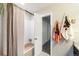 Bathroom with shower and tub and access to another room with closet at 1140 Magic Lamp Way # 4, Monument, CO 80132