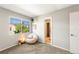 Bedroom with carpet, window, chair and access to a bathroom at 1140 Magic Lamp Way # 4, Monument, CO 80132