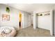 Bedroom with carpet, window, closet and access to a bathroom at 1140 Magic Lamp Way # 4, Monument, CO 80132