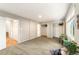 Large bedroom with carpet, windows, multiple closets and access to hall at 1140 Magic Lamp Way # 4, Monument, CO 80132