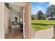 Welcoming entryway with wood floors, modern decor, and a glimpse of the bright, open living space at 1140 Magic Lamp Way # 4, Monument, CO 80132