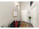 Well-decorated entryway featuring stylish accents, modern lighting, and sleek wood-look flooring at 1140 Magic Lamp Way # 4, Monument, CO 80132