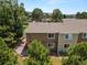 Back of house with view of the back patio and fenced yard at 1140 Magic Lamp Way # 4, Monument, CO 80132