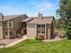 Stunning view of exterior showcasing lush greenery, landscaped grounds, and architecture of the building at 1140 Magic Lamp Way # 4, Monument, CO 80132