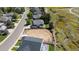 Aerial shot of a property showcasing a spacious lot, modern home, and community landscape at 882 Eldorado Dr, Superior, CO 80027