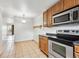 Updated kitchen with stainless steel appliances, tiled floor and plenty of room at 8460 Decatur St # 138, Westminster, CO 80031