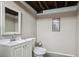 Basement bath with neutral walls, white vanity, and a chrome faucet at 972 Park View St, Castle Rock, CO 80104