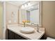 Bathroom vanity featuring a granite-look top, vessel sink and chrome faucet at 5653 E Southmoor Cir, Englewood, CO 80111