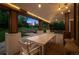 Outdoor patio with a dining table and overhead lighting, perfect for entertaining at 5653 E Southmoor Cir, Englewood, CO 80111