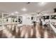 Spacious home gym with mirrored walls and an exercise rower at 7851 E 148Th Dr, Thornton, CO 80602