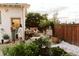 Backyard area with dining area and gathering of friends, garden, and landscaping at 4212 Lowell Blvd, Denver, CO 80211