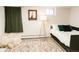 Cozy bedroom features a modern rug, stylish accents, and comfortable furnishings, perfect for relaxation at 4212 Lowell Blvd, Denver, CO 80211