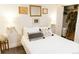 Bright bedroom features closet, wall decor, and plush pillows, offering a comfortable and stylish retreat at 4212 Lowell Blvd, Denver, CO 80211