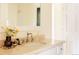Bright bathroom featuring a cream-colored vanity, vessel sink, and decorative accents at 5700 S Steele St, Greenwood Village, CO 80121