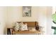 Hallway showcasing a woven bench with decorative pillows at 5700 S Steele St, Greenwood Village, CO 80121