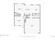Floor plan of the main level of a home, including kitchen, living room, and garage at 5130 S Wenatchee St, Aurora, CO 80015