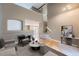 Spacious open concept living room with wood floors and staircase at 5130 S Wenatchee St, Aurora, CO 80015
