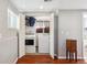 Bright laundry room featuring a washer and dryer inside of a closet, with plenty of natural light at 6690 Albion St, Commerce City, CO 80022