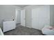 bedroom with white dresser and closet at 28418 E 8Th Pl, Watkins, CO 80137