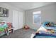 bedroom with twin bed and ample closet space at 28418 E 8Th Pl, Watkins, CO 80137