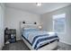 Bedroom with a queen bed and gray carpet at 28418 E 8Th Pl, Watkins, CO 80137