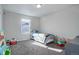 bedroom with a twin bed and toys at 28418 E 8Th Pl, Watkins, CO 80137