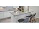 Modern kitchen with gray countertops and stainless steel appliances at 28418 E 8Th Pl, Watkins, CO 80137