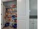 Well-stocked pantry with ample shelving at 28418 E 8Th Pl, Watkins, CO 80137