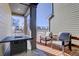 Relaxing patio with fire pit and seating area at 28418 E 8Th Pl, Watkins, CO 80137