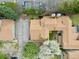 Aerial view highlighting unit layout, patio space, and mature landscaping of the property at 1080 S Yampa St, Aurora, CO 80017