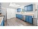 Bright kitchen with stainless steel appliances, modern fixtures, and a skylight for natural light at 1080 S Yampa St, Aurora, CO 80017