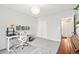 Bright office area with lots of workspace and overhead lighting at 1080 S Yampa St, Aurora, CO 80017