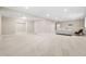 Spacious finished basement featuring neutral carpet, recessed lighting, and an open layout for flexible use at 14303 Glenayre Cir, Parker, CO 80134