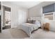 Bedroom with carpeted floors, a double bed and a large window at 14303 Glenayre Cir, Parker, CO 80134