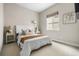 Bedroom with carpeted floors, neutral paint and a large window at 14303 Glenayre Cir, Parker, CO 80134