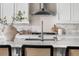 This large kitchen island features a bar style sink and faucet at 14303 Glenayre Cir, Parker, CO 80134