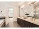 Bathroom features double sinks, a soaking tub, and tiled floors at 2038 S Columbine St, Denver, CO 80210