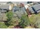 Aerial view of the property highlighting the fenced yard and solar panels on the roof at 6213 S Lima Way, Englewood, CO 80111