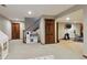 Finished basement with a play area, workout area, and ample storage space, perfect for recreation at 6213 S Lima Way, Englewood, CO 80111