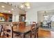 Spacious dining area connected to the kitchen, with views of the main living area at 6213 S Lima Way, Englewood, CO 80111