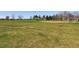 View of a wide open grassy field with baseball diamond, perfect for outdoor recreation and sports at 6213 S Lima Way, Englewood, CO 80111