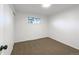 This bedroom has a carpeted floor, white walls, a window, and a closet at 1153 Sherman St, Longmont, CO 80501