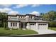 Beautiful new construction two-story home with stone accents, attached two-car garage, and manicured lawn at 1598 Green Fern Pt, Castle Rock, CO 80104