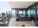 Stunning balcony view showcasing comfortable seating and a grill, perfect for outdoor relaxation and entertainment at 1133 14Th St # 4150, Denver, CO 80202