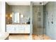 Modern bathroom featuring glass enclosed shower, sleek vanity, and stone countertops offers a spa-like experience at 1133 14Th St # 4150, Denver, CO 80202