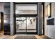 Contemporary building entrance showcasing modern glass doors and design elements for a sophisticated arrival at 1133 14Th St # 4150, Denver, CO 80202