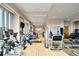 Modern gym equipped with a variety of cardio and strength training machines and mirrored walls at 1133 14Th St # 4150, Denver, CO 80202