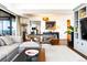 Spacious living room boasts stylish decor, a pool table, and stunning views, perfect for entertaining at 1133 14Th St # 4150, Denver, CO 80202