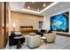 Comfortable lounge with a fireplace and plush seating offers a relaxing space for residents and guests at 1133 14Th St # 4150, Denver, CO 80202