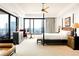 Relaxing main bedroom with expansive city views, stylish furniture, and abundant natural light at 1133 14Th St # 4150, Denver, CO 80202